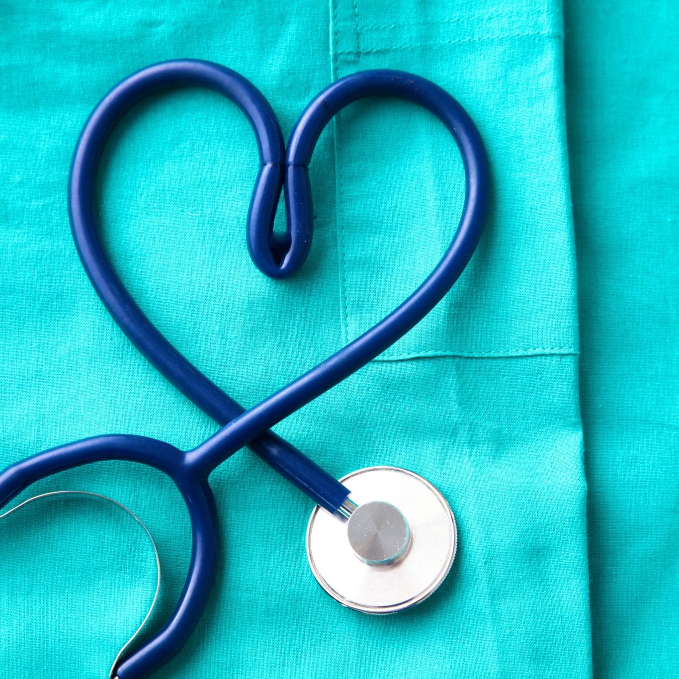 Stethoscope Shaping Heart And Clipboard On Medical Uniform, Closeup Physicians Council